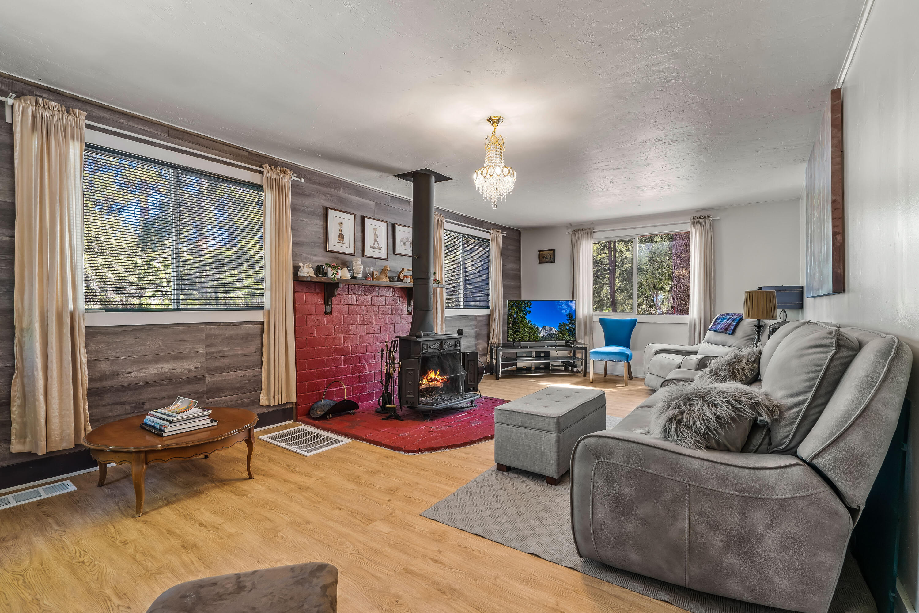 23061 Banning Idyllwild Road Idyllwild, CA 92549 - Photo 18 of 46 a living room with fireplace furniture and a large window