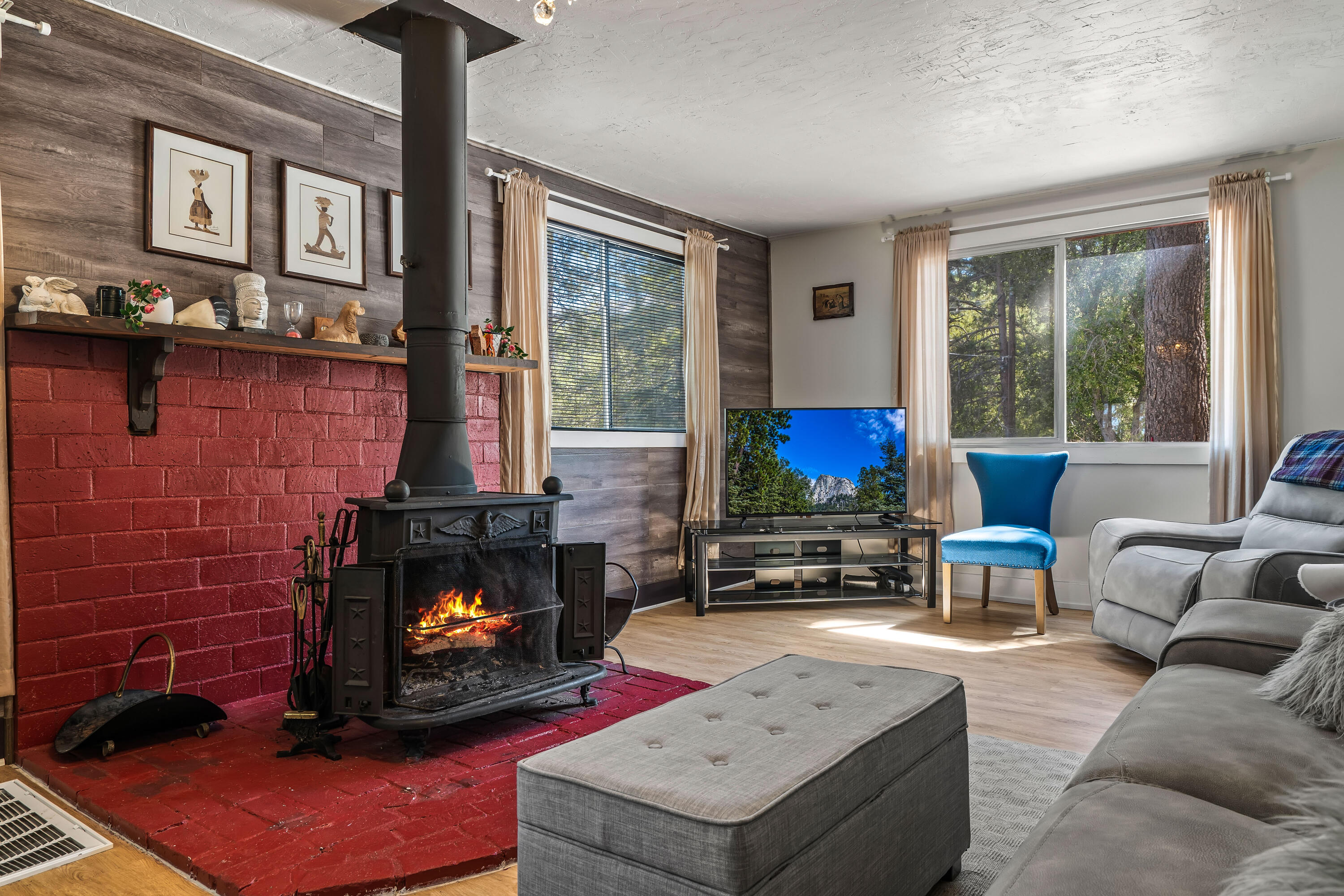 23061 Banning Idyllwild Road Idyllwild, CA 92549 - Photo 19 of 46 a living room with furniture and a fireplace