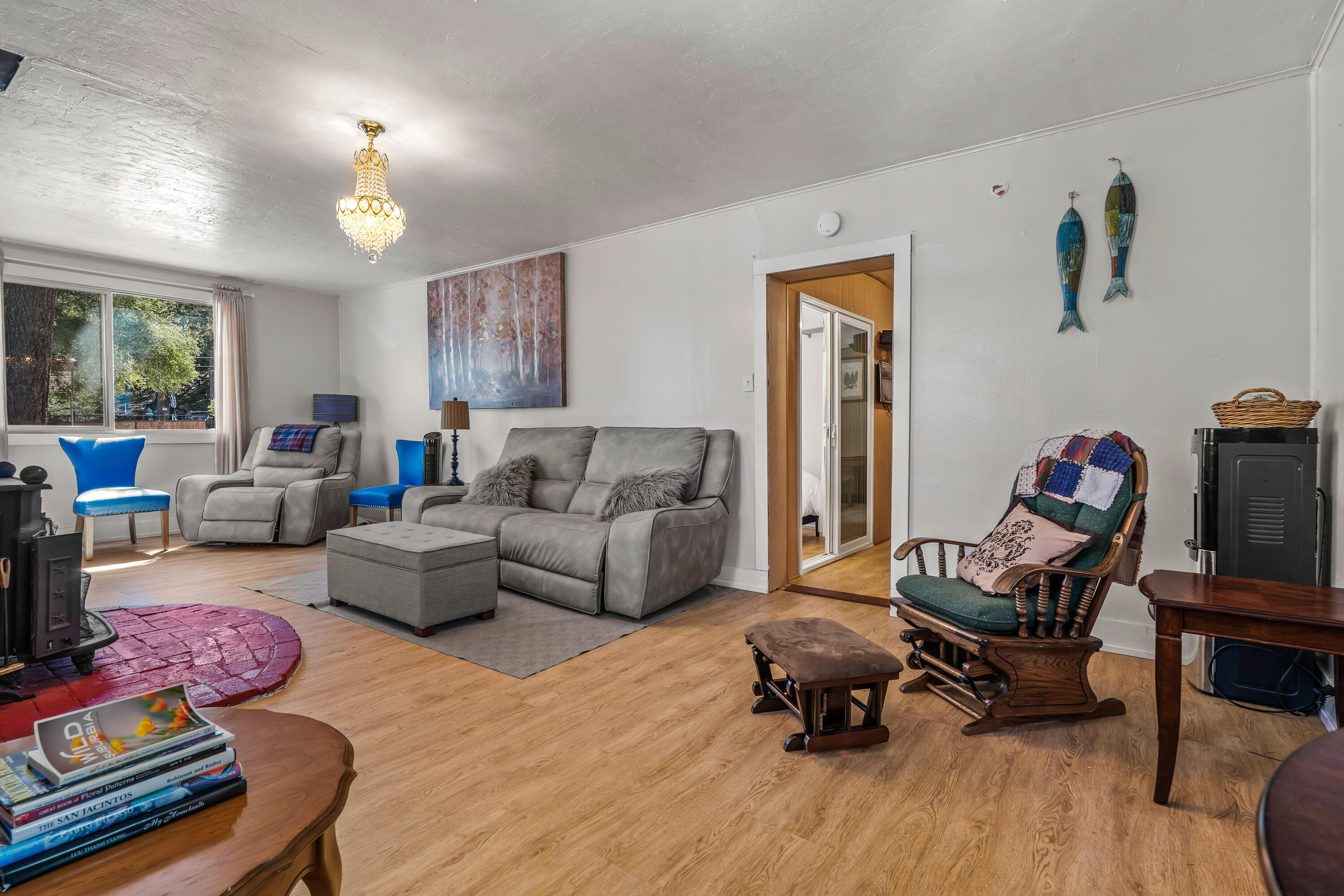 23061 Banning Idyllwild Road Idyllwild, CA 92549 - Photo 21 of 46 a living room with furniture and wooden floor