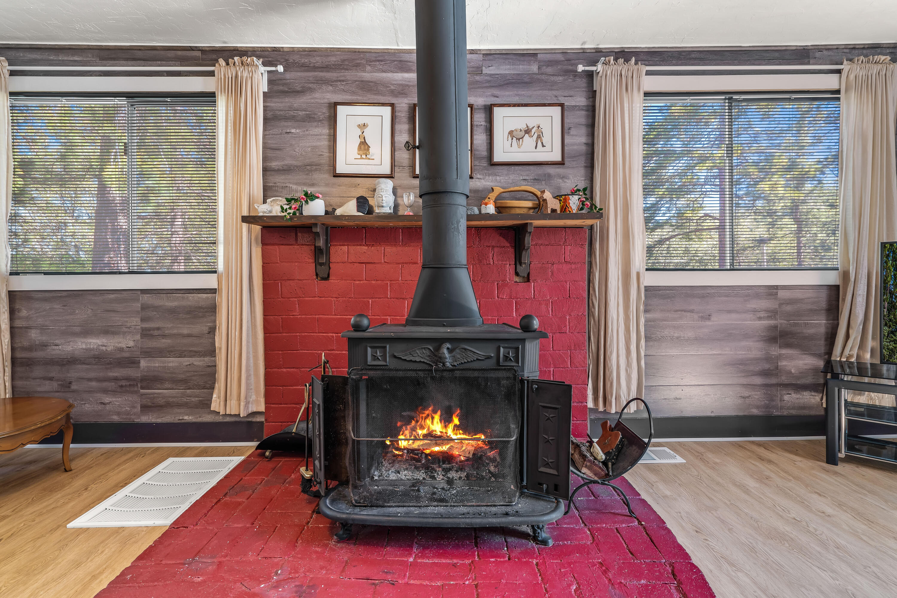 23061 Banning Idyllwild Road Idyllwild, CA 92549 - Photo 23 of 46 a living room with furniture a window and a fireplace