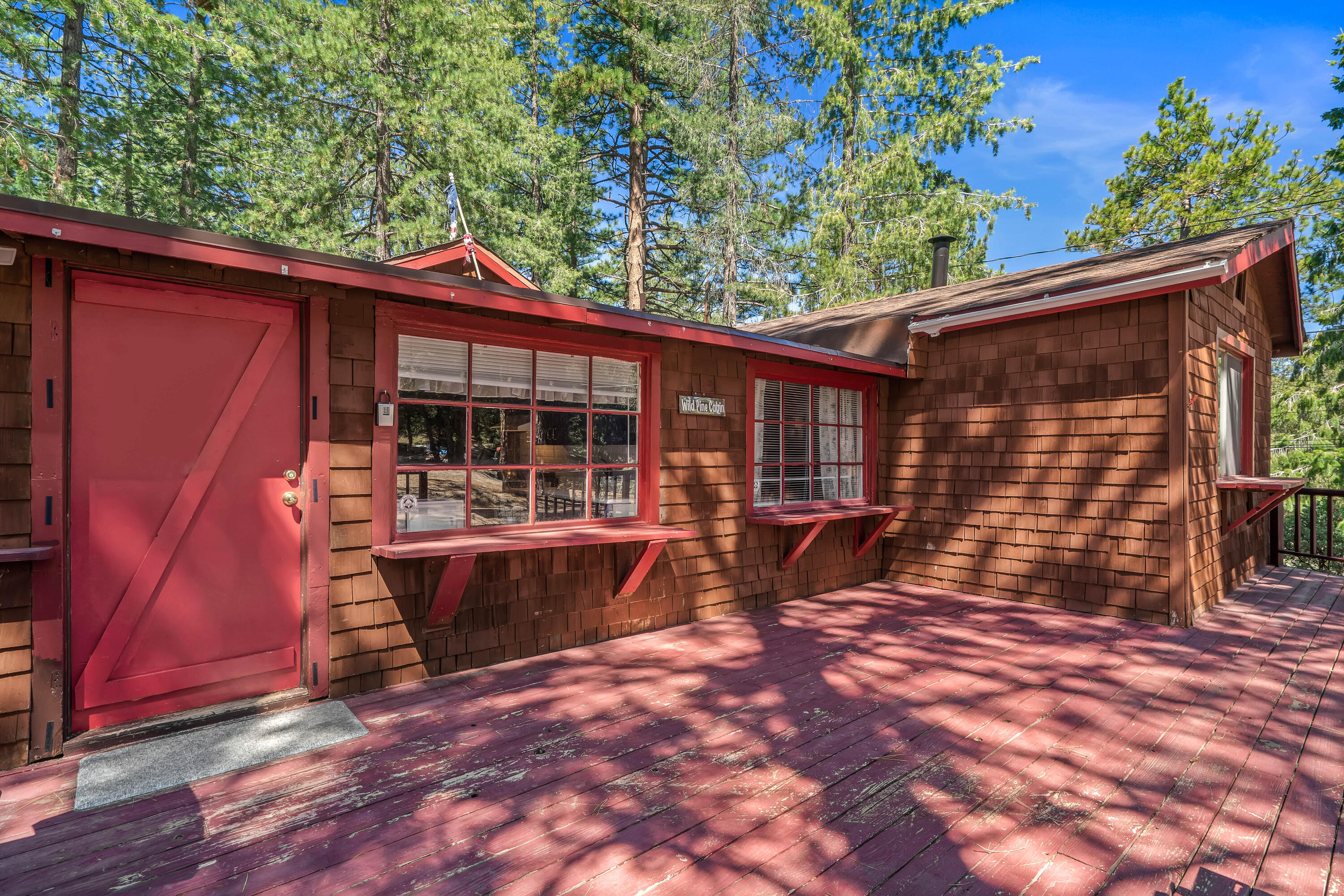 23061 Banning Idyllwild Road Idyllwild, CA 92549 - Photo 4 of 46 a view of house with backyard outdoor seating and yard
