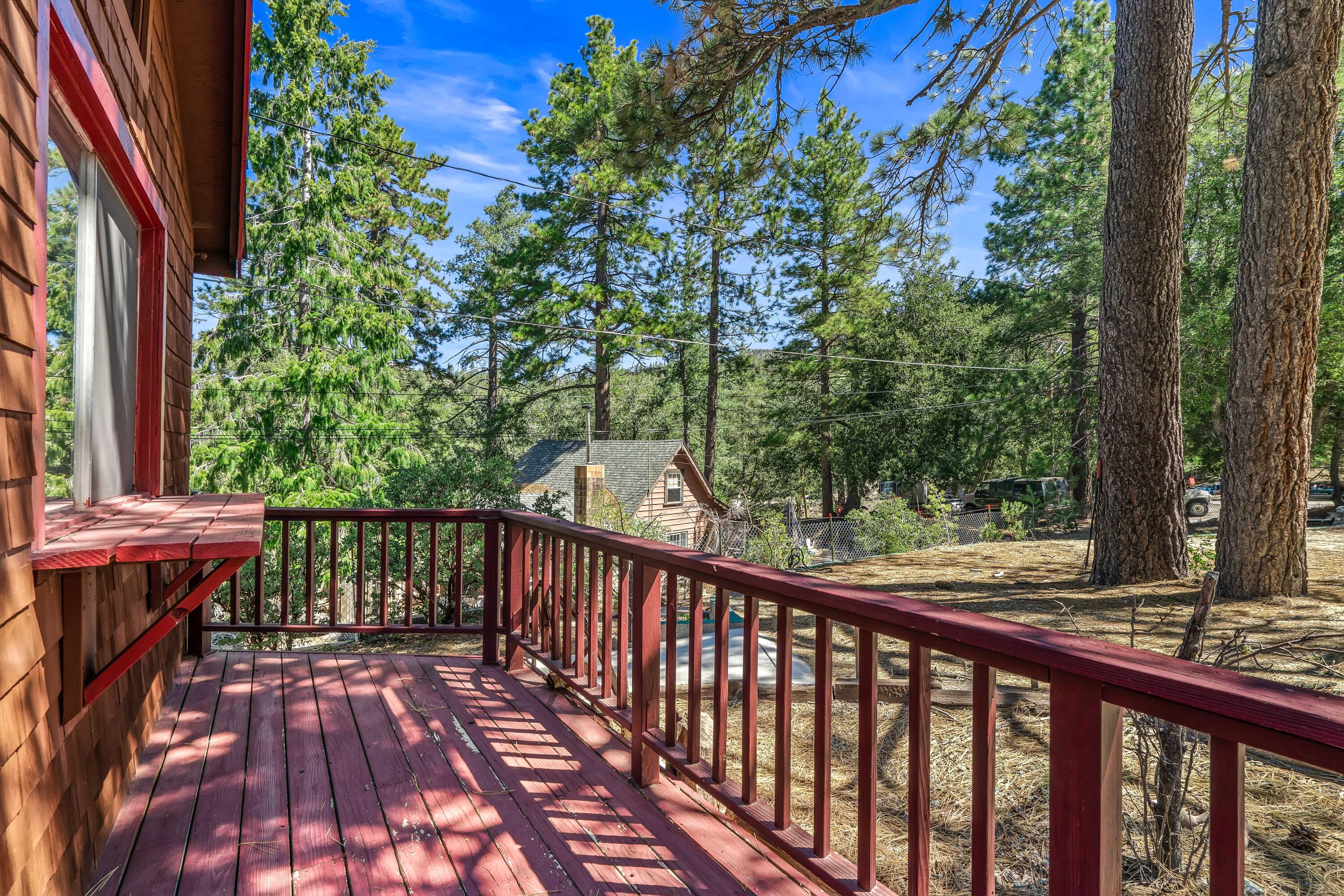 23061 Banning Idyllwild Road Idyllwild, CA 92549 - Photo 7 of 46 a view of a balcony with wooden floor