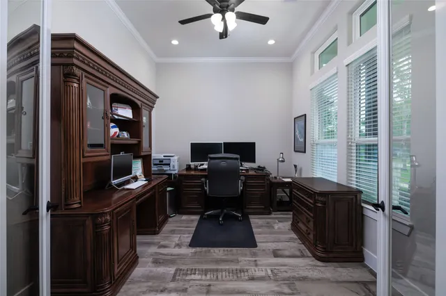 a kitchen with a refrigerator and a sink