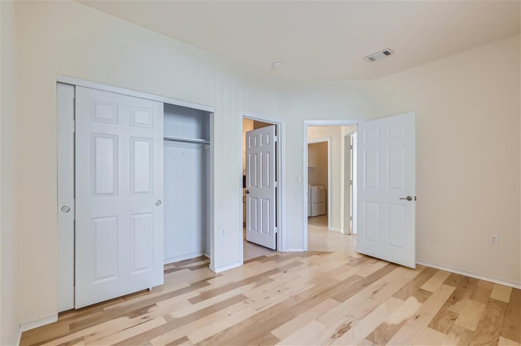 212 Summer Road Georgetown, TX 78633 - Photo 16 of 18 a view of empty room with wooden floor