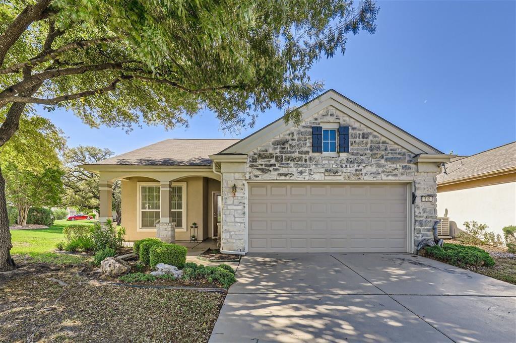 212 Summer Road Georgetown, TX 78633 - Photo 6 of 18 a front view of a house with a yard