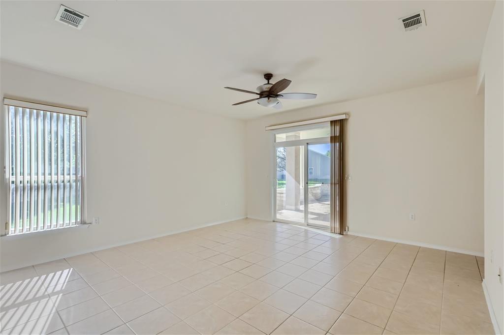 212 Summer Road Georgetown, TX 78633 - Photo 8 of 18 a view of an empty room with a window
