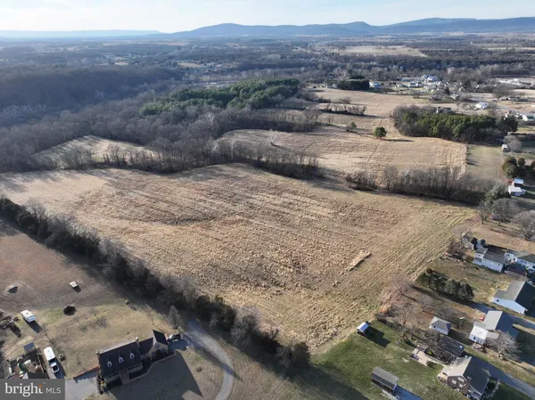 a view of a lake with mountain