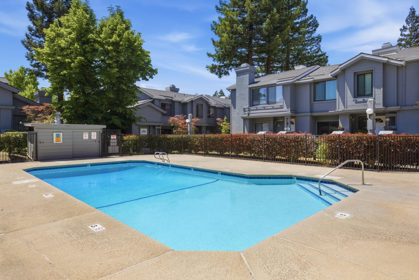 1669 Geary Road Walnut Creek, CA 94597 - Photo 38 of 39 a view of a building with a swimming pool