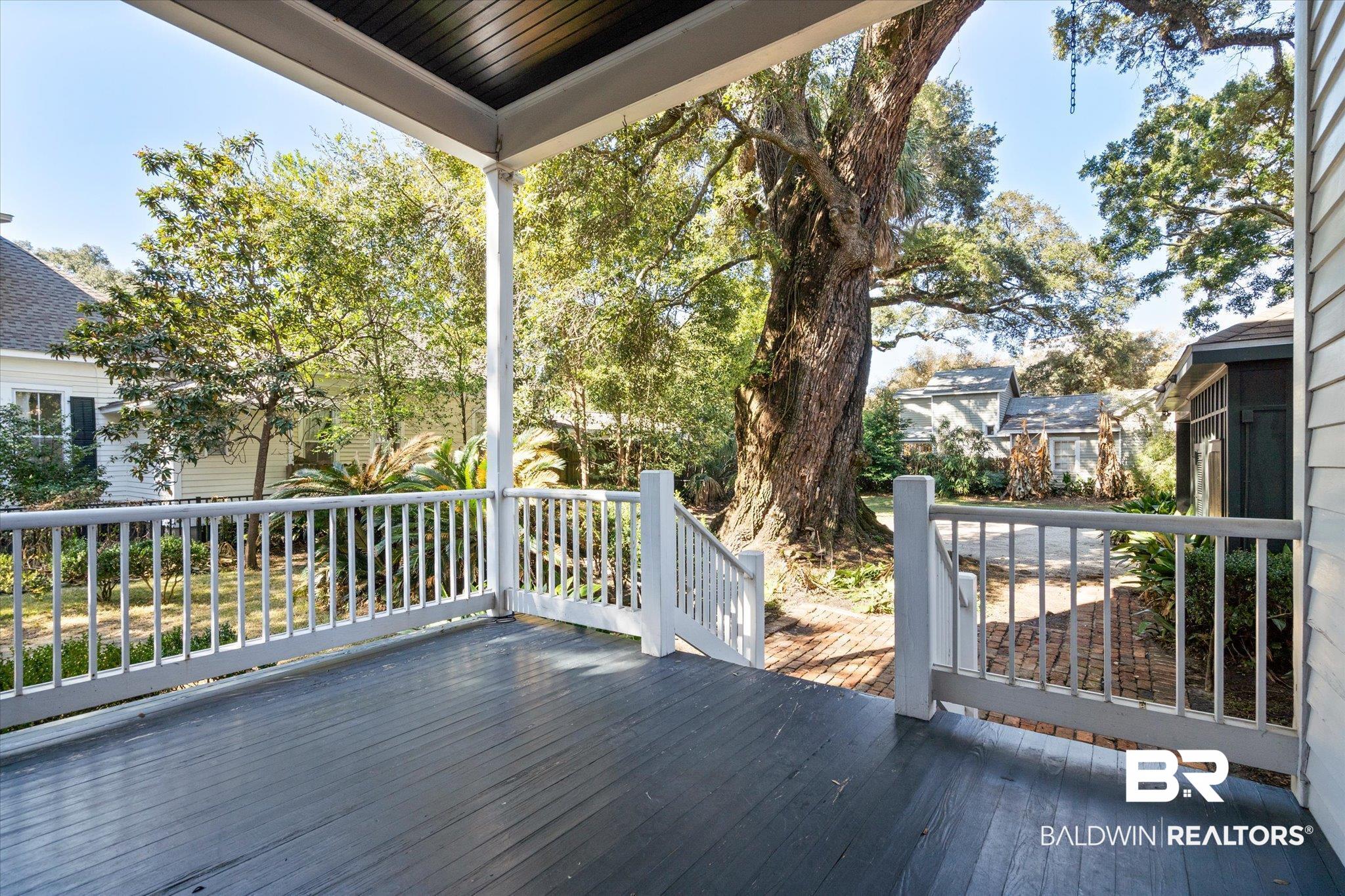 950 Palmetto Street Mobile, AL 36604 - Photo 25 of 33 View of rear downstairs porch off of breakfast room