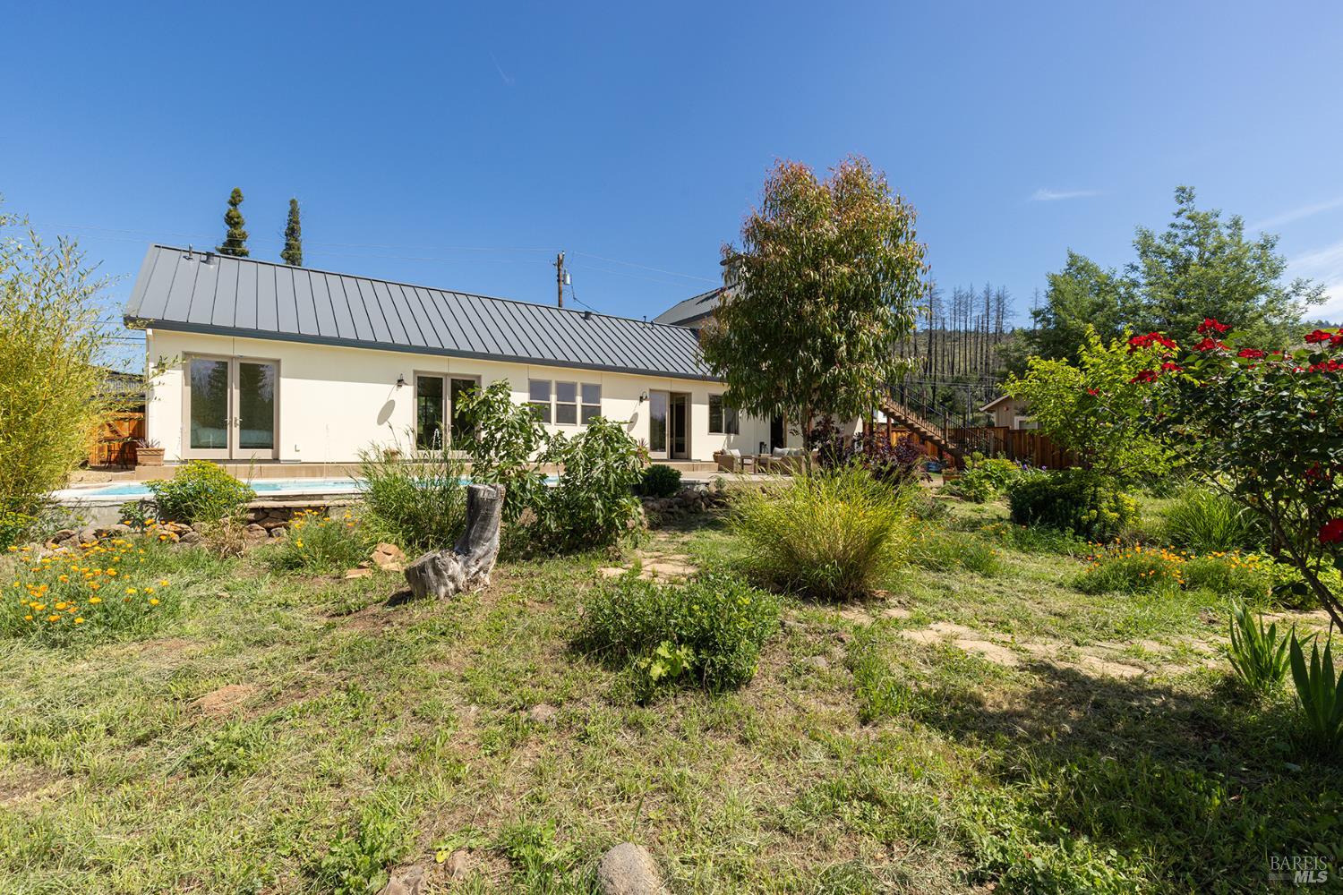 753 Sunnyside Road St. Helena, CA 94574 - Photo 55 of 55 a view of a house with a yard