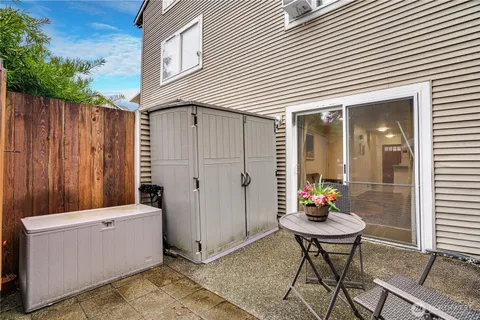 a view of a porch with furniture and yard