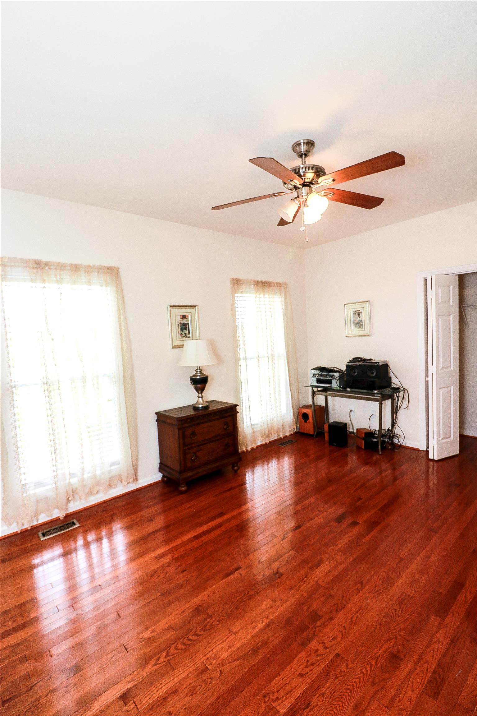 3290 Greens Mill Road Spring Hill, TN 37174 - Photo 8 of 24 a living room with furniture and wooden floor