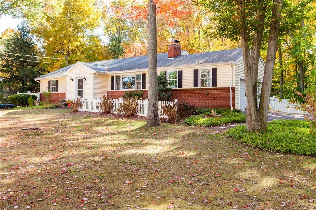 129 Stepstone Hill Road Guilford, CT 06437 - Photo 1 of 1 a view of white house with a big yard and large trees