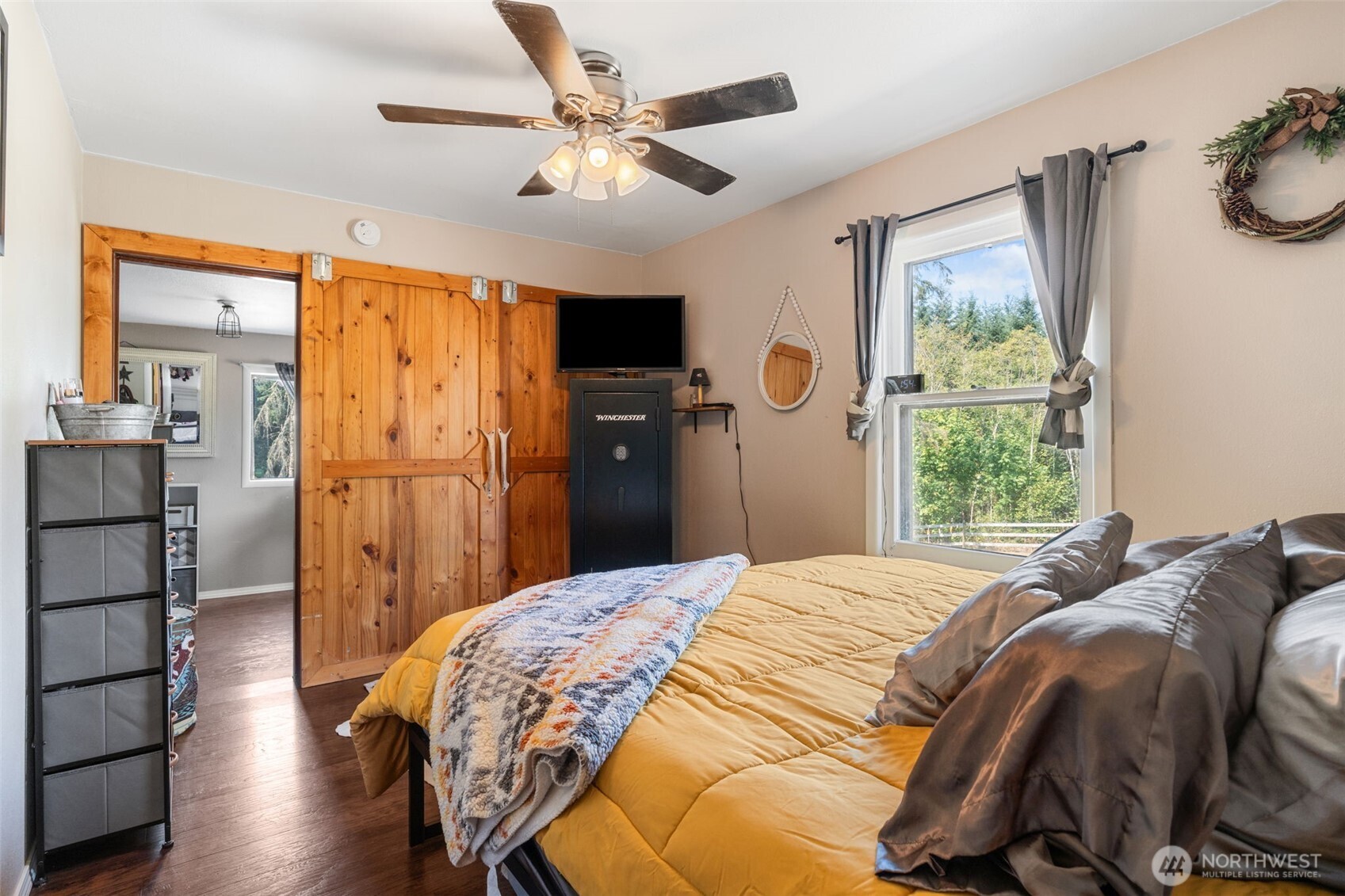 248 Crego Hill Road Chehalis, WA 98532 - Photo 12 of 39 a bedroom with a bed dresser and a window