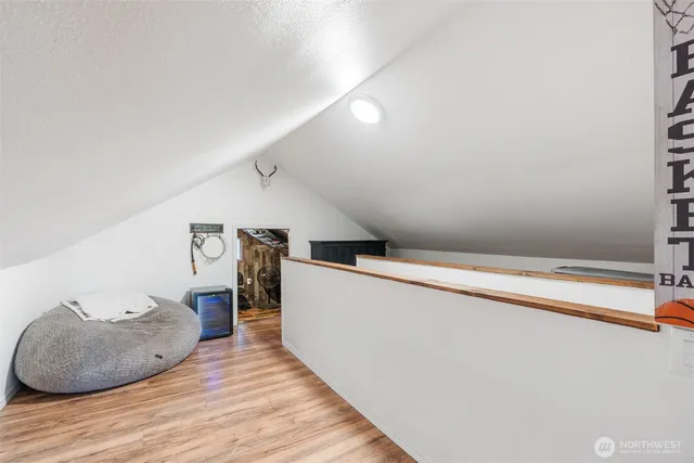 a view of livingroom with furniture and wooden floor