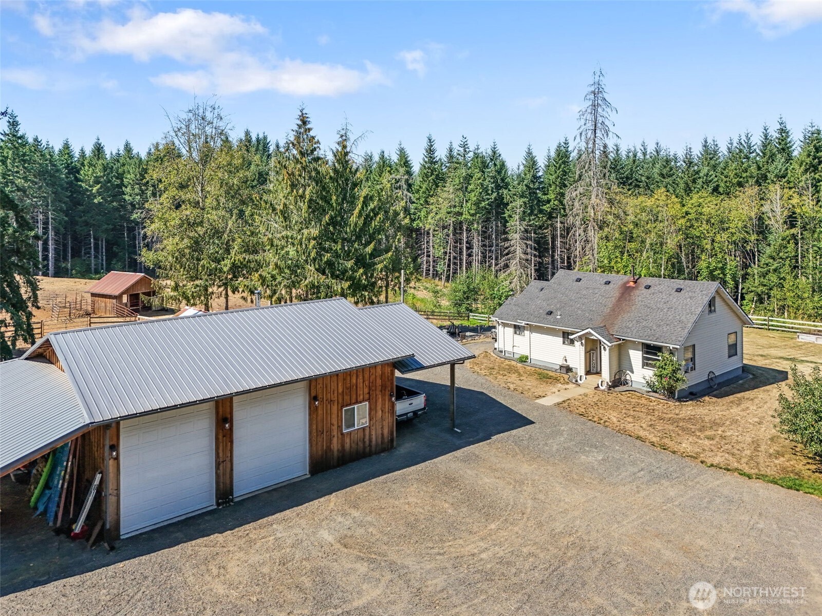 248 Crego Hill Road Chehalis, WA 98532 - Photo 2 of 39 a view of a house with a outdoor space and sitting area