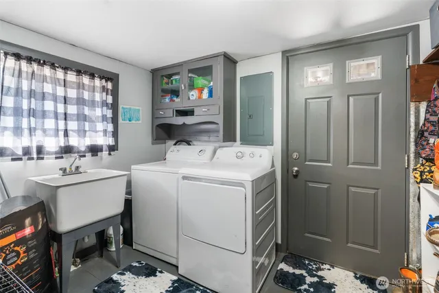 a utility room with dryer and washer