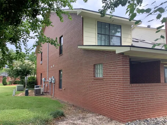 a backyard of a house with seating space