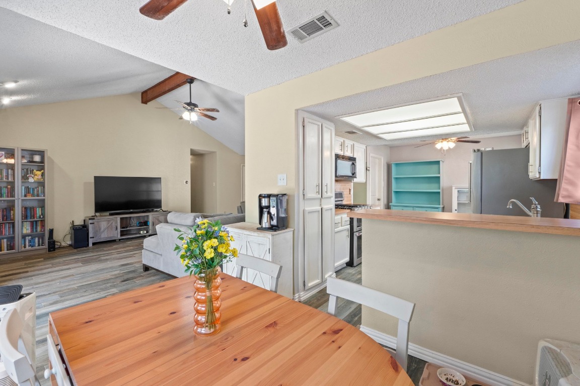 811 Timber Trail Cedar Park, TX 78613 - Photo 11 of 30 a living room with furniture and a flat screen tv