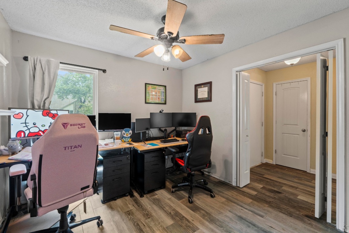 811 Timber Trail Cedar Park, TX 78613 - Photo 20 of 30 a view of a workspace with furniture and a window