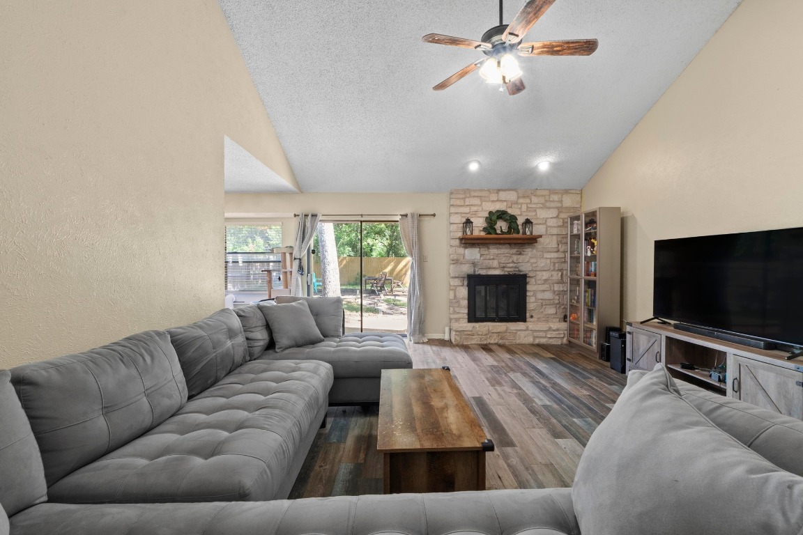 811 Timber Trail Cedar Park, TX 78613 - Photo 6 of 30 a living room with furniture and a flat screen tv