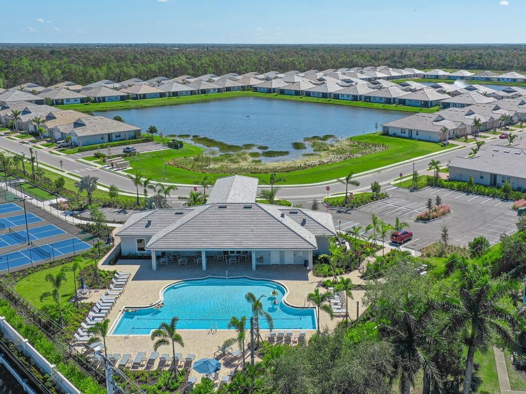 1087 Rolling Brk Lane Naples, FL 34114 - Photo 23 of 33 an aerial view of a house with a ocean view