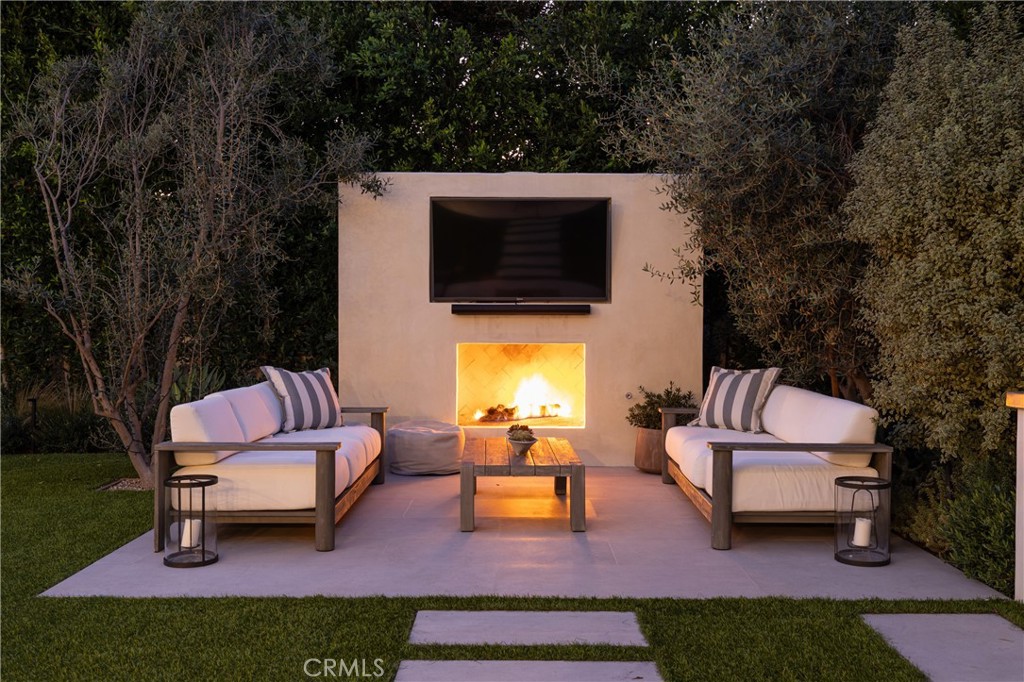 419 Signal Road Newport Beach, CA 92663 - Photo 30 of 32 a outdoor living space with furniture and a fireplace
