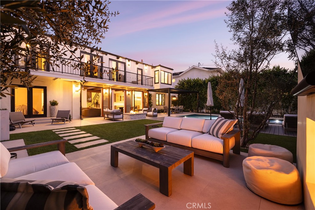 419 Signal Road Newport Beach, CA 92663 - Photo 3 of 32 a building outdoor space with patio couches and potted plants