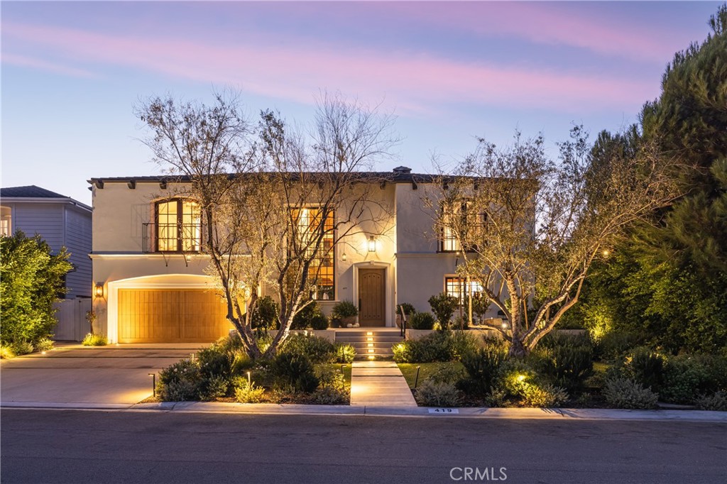 419 Signal Road Newport Beach, CA 92663 - Photo 32 of 32 a view of a house with a swimming pool and a yard