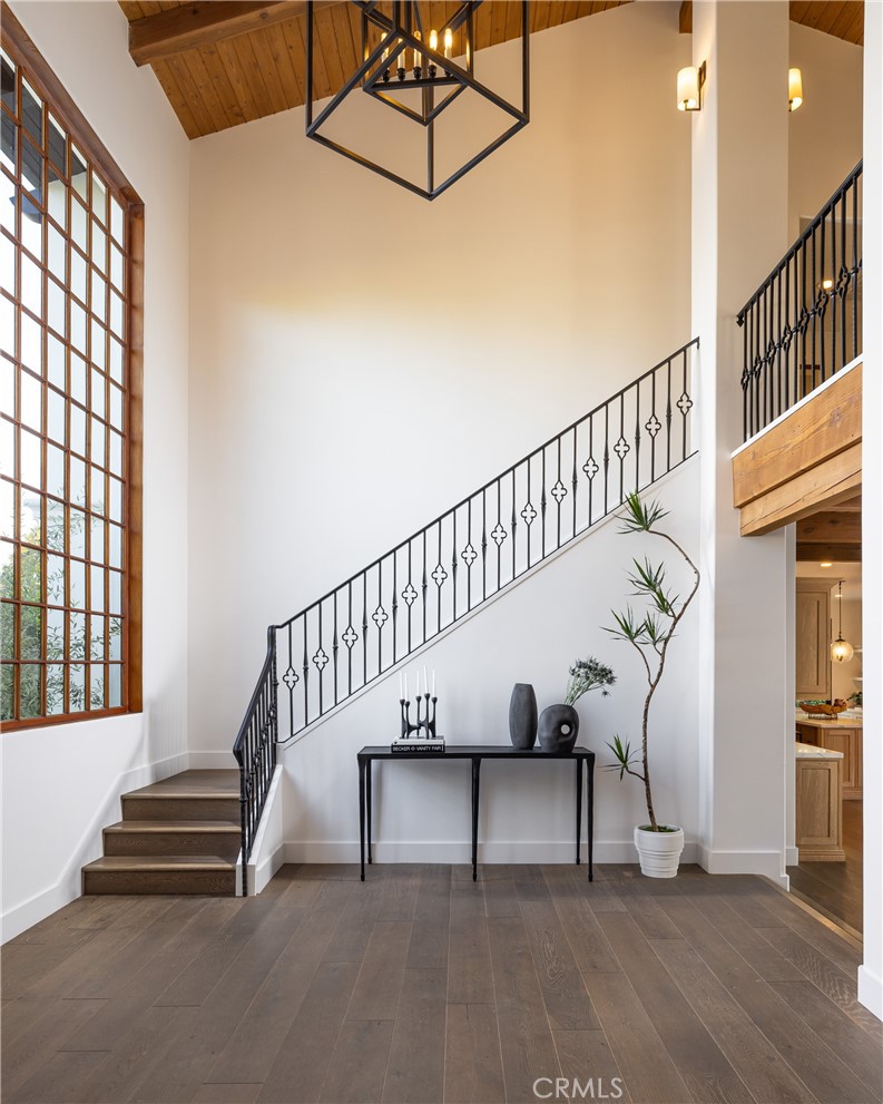 419 Signal Road Newport Beach, CA 92663 - Photo 4 of 32 a view of entryway with wooden floor and stairs