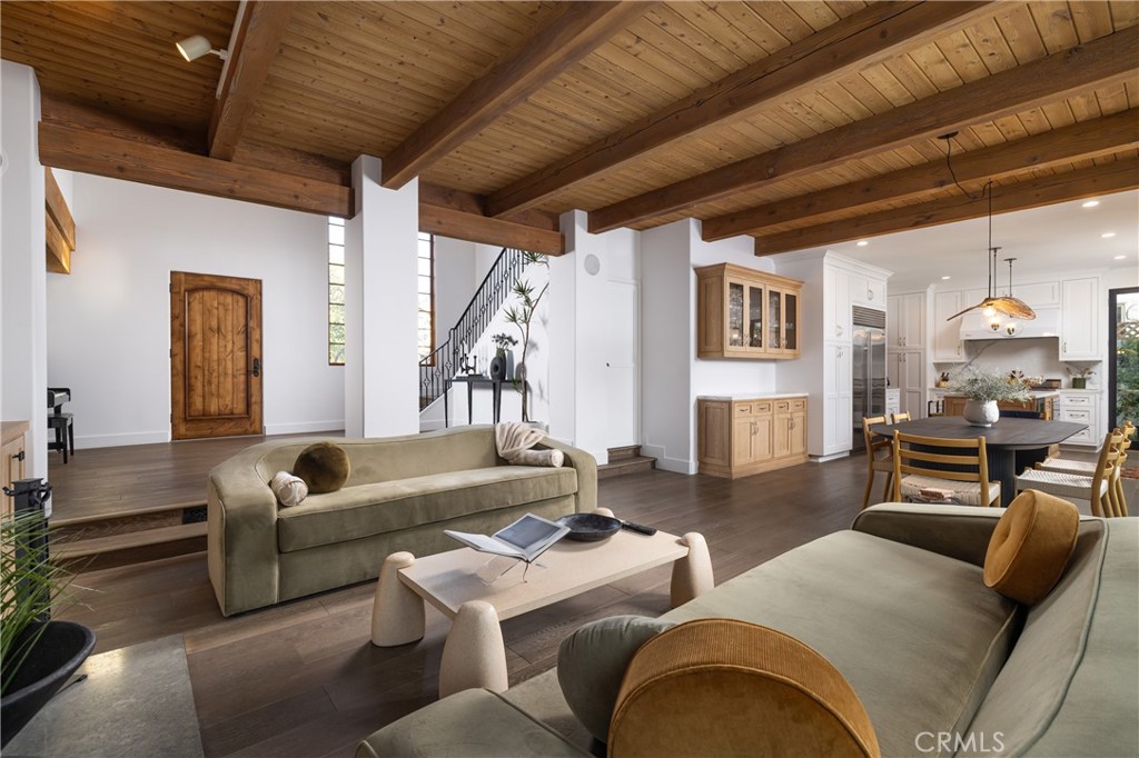 419 Signal Road Newport Beach, CA 92663 - Photo 8 of 32 a living room with fireplace furniture and a wooden floor