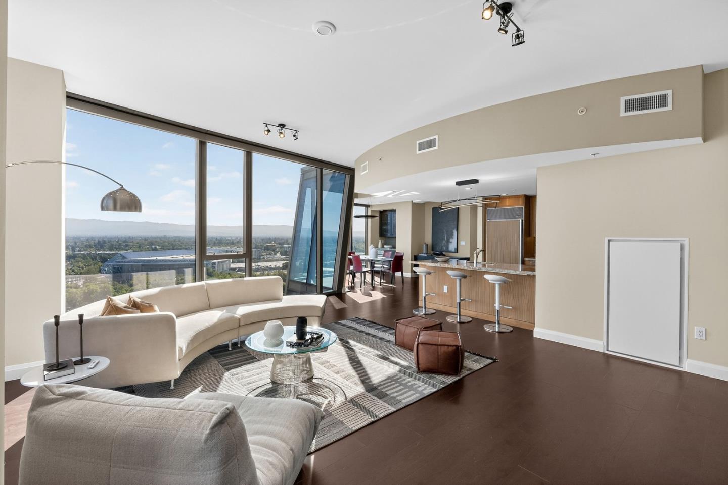 38 North Almaden Boulevard, Unit 2001 San Jose, CA 95110 - Photo 11 of 44 a living room with furniture and a large window