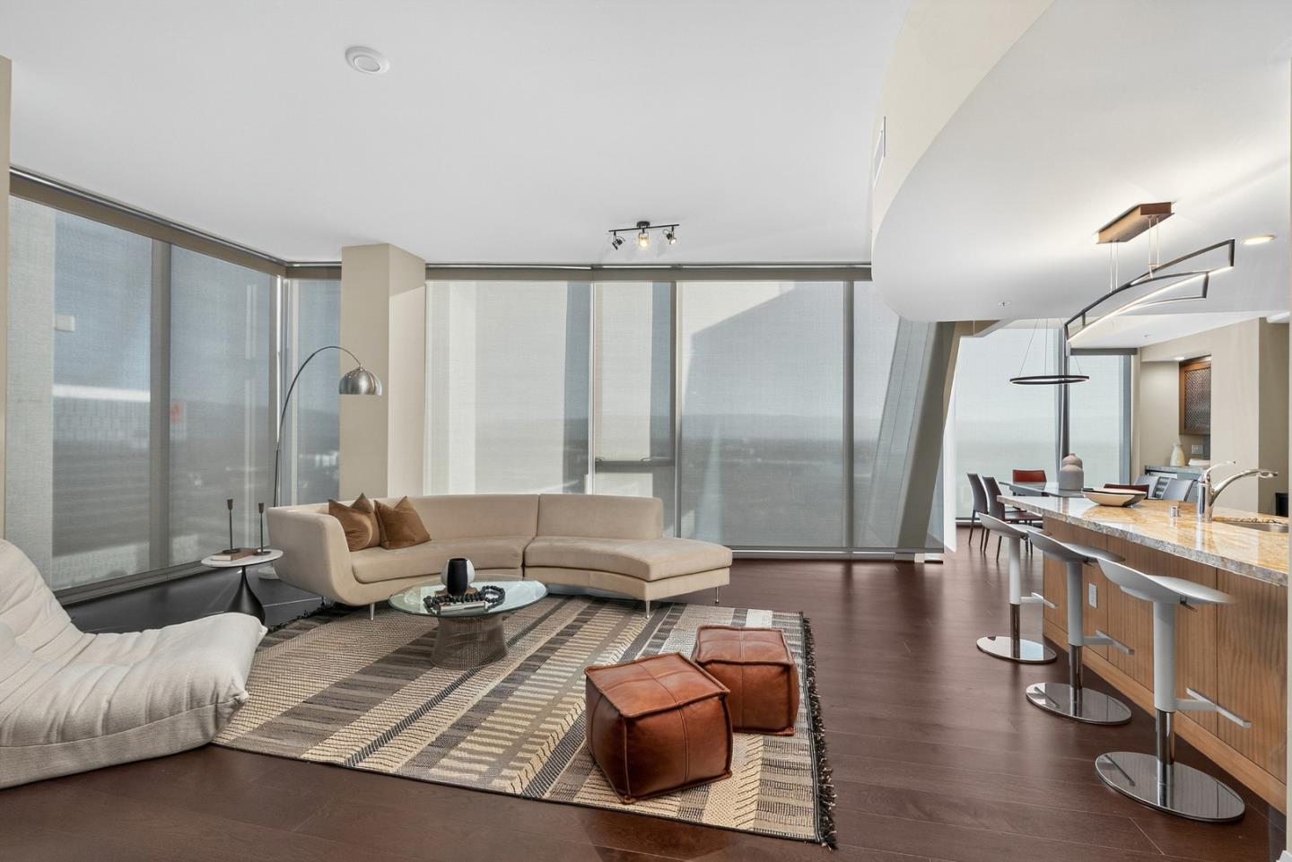 38 North Almaden Boulevard, Unit 2001 San Jose, CA 95110 - Photo 15 of 44 a living room with furniture and a large window