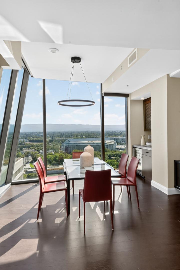 38 North Almaden Boulevard, Unit 2001 San Jose, CA 95110 - Photo 19 of 44 a dining room with furniture window and wooden floor