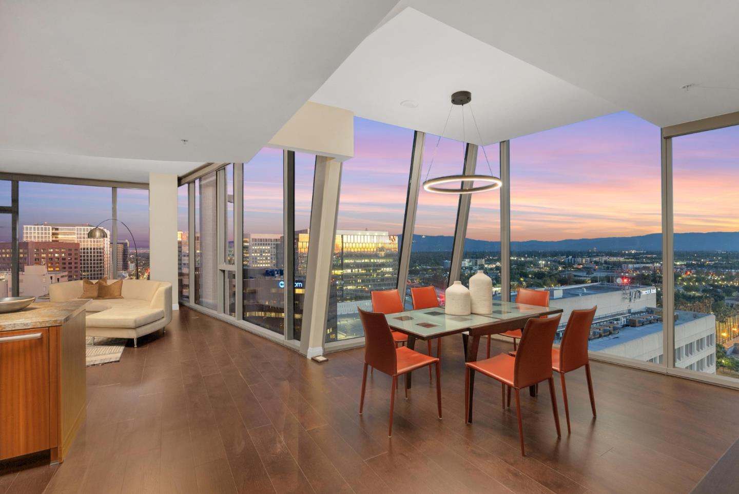38 North Almaden Boulevard, Unit 2001 San Jose, CA 95110 - Photo 2 of 44 a dining room with furniture and a floor to ceiling window