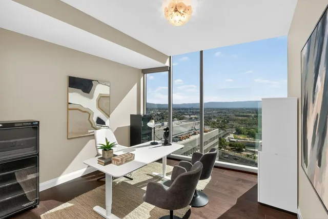 a view of a livingroom with furniture and wooden floor