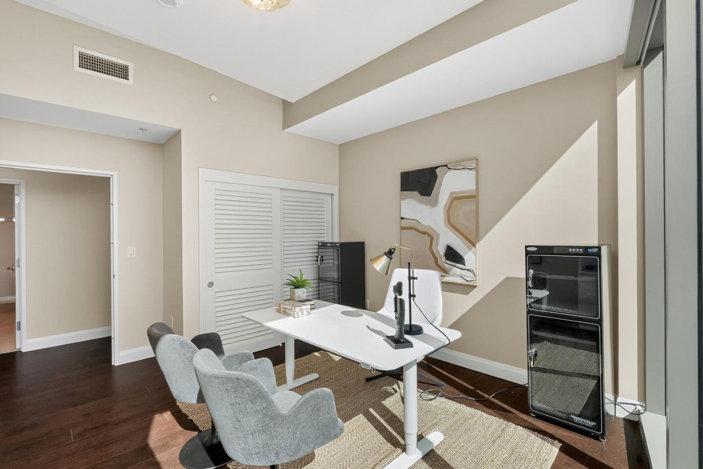 38 North Almaden Boulevard, Unit 2001 San Jose, CA 95110 - Photo 40 of 44 a view of a livingroom with furniture and wooden floor