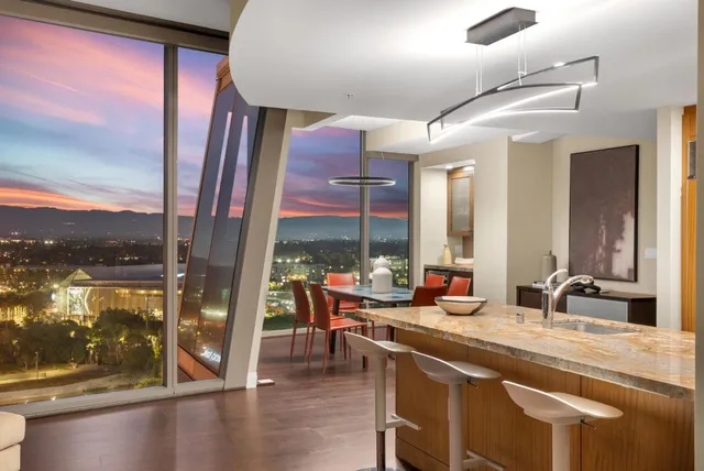 a view of a living room with furniture