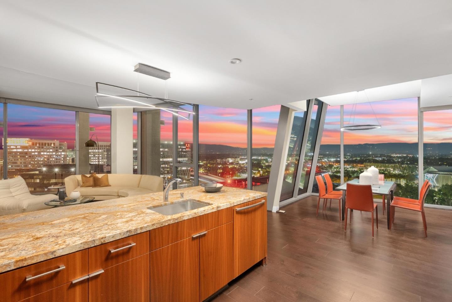 38 North Almaden Boulevard, Unit 2001 San Jose, CA 95110 - Photo 8 of 44 a living room with furniture city view and large windows