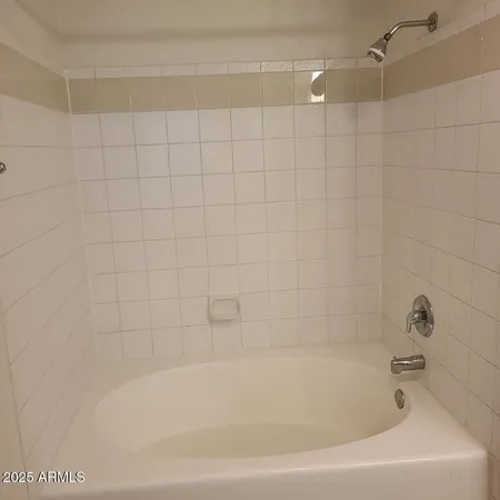 a bathroom with a bathtub