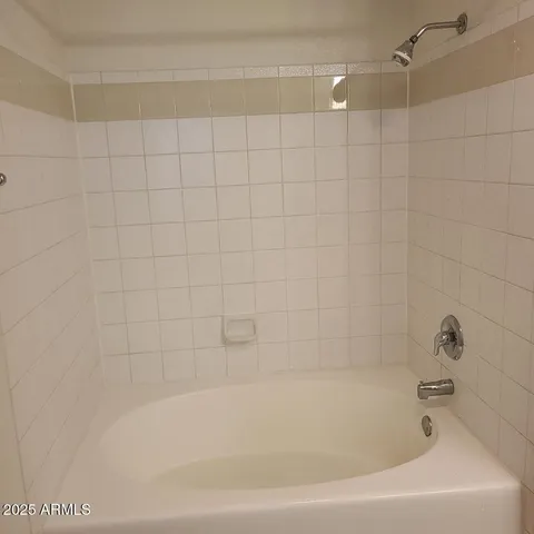 a bathroom with a bathtub