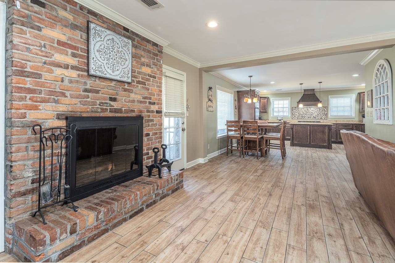 268 Andrew Way Road Collierville, TN 38017 - Photo 8 of 36 a view of a kitchen with furniture and a fireplace