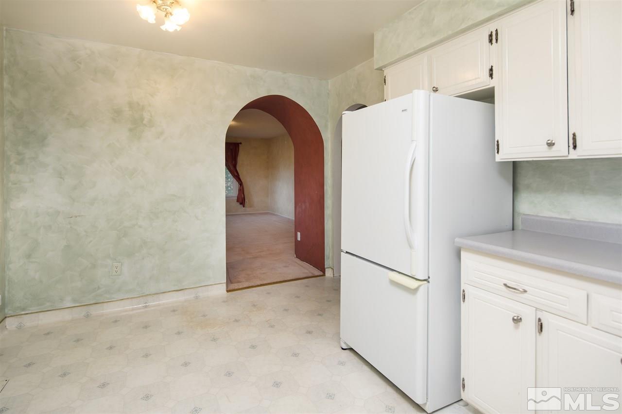3375 Lookout Place Reno, NV 89503 - Photo 18 of 25 a view of a kitchen with a refrigerator and cabinets