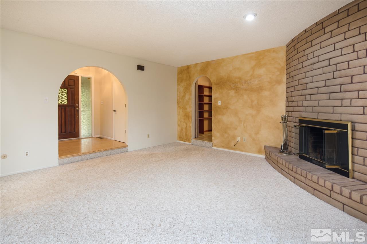 3375 Lookout Place Reno, NV 89503 - Photo 3 of 25 a view of an empty room with a fireplace