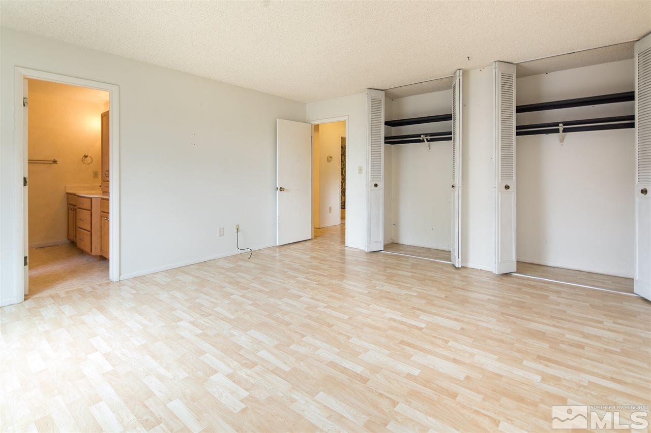 3375 Lookout Place Reno, NV 89503 - Photo 7 of 25 a view of an empty room with closet and a bathroom