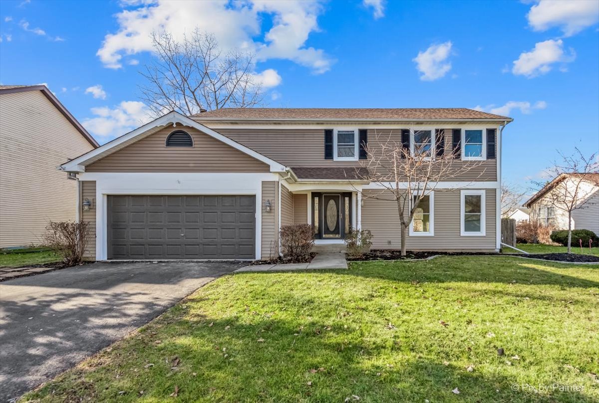 2004 Clematis Drive Algonquin, IL 60102 - Photo 1 of 44 a front view of a house with a yard