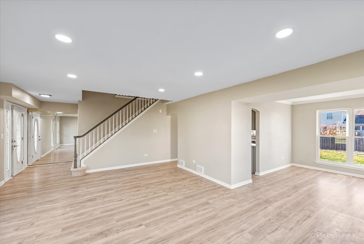 2004 Clematis Drive Algonquin, IL 60102 - Photo 15 of 44 a view of an empty room with wooden floor