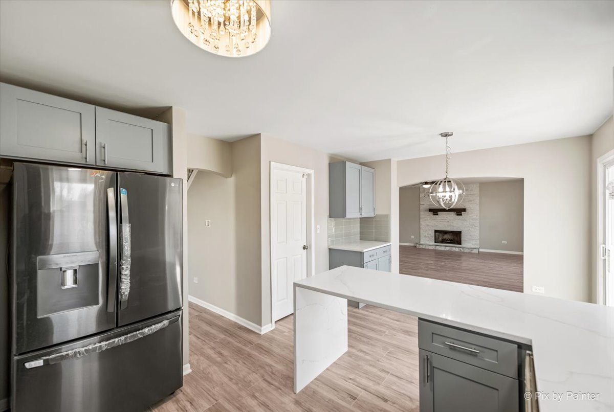 2004 Clematis Drive Algonquin, IL 60102 - Photo 19 of 44 a kitchen with stainless steel appliances a refrigerator and a sink