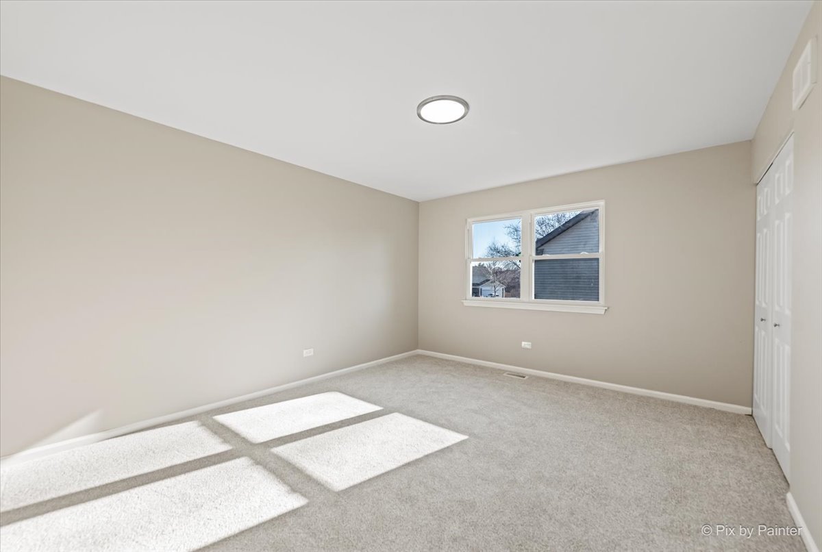 2004 Clematis Drive Algonquin, IL 60102 - Photo 28 of 44 an empty room with windows