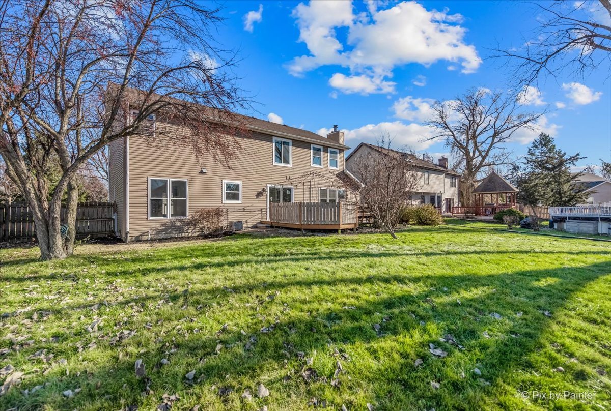 2004 Clematis Drive Algonquin, IL 60102 - Photo 40 of 44 a front view of house with yard and green space